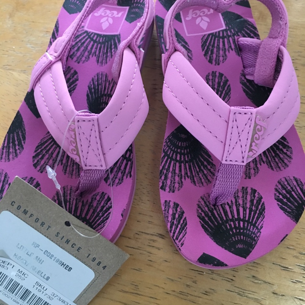 Purple reef flip flops